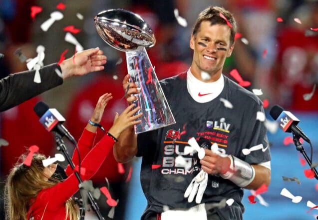 Feb 7, 2021; Tampa, FL, USA;  Tampa Bay Buccaneers quarterback Tom Brady (12) celebrates with the Vince Lombardi Trophy after beating the Kansas City Chiefs in Super Bowl LV at Raymond James Stadium.  Mandatory Credit: Mark J. Rebilas-USA TODAY Sports